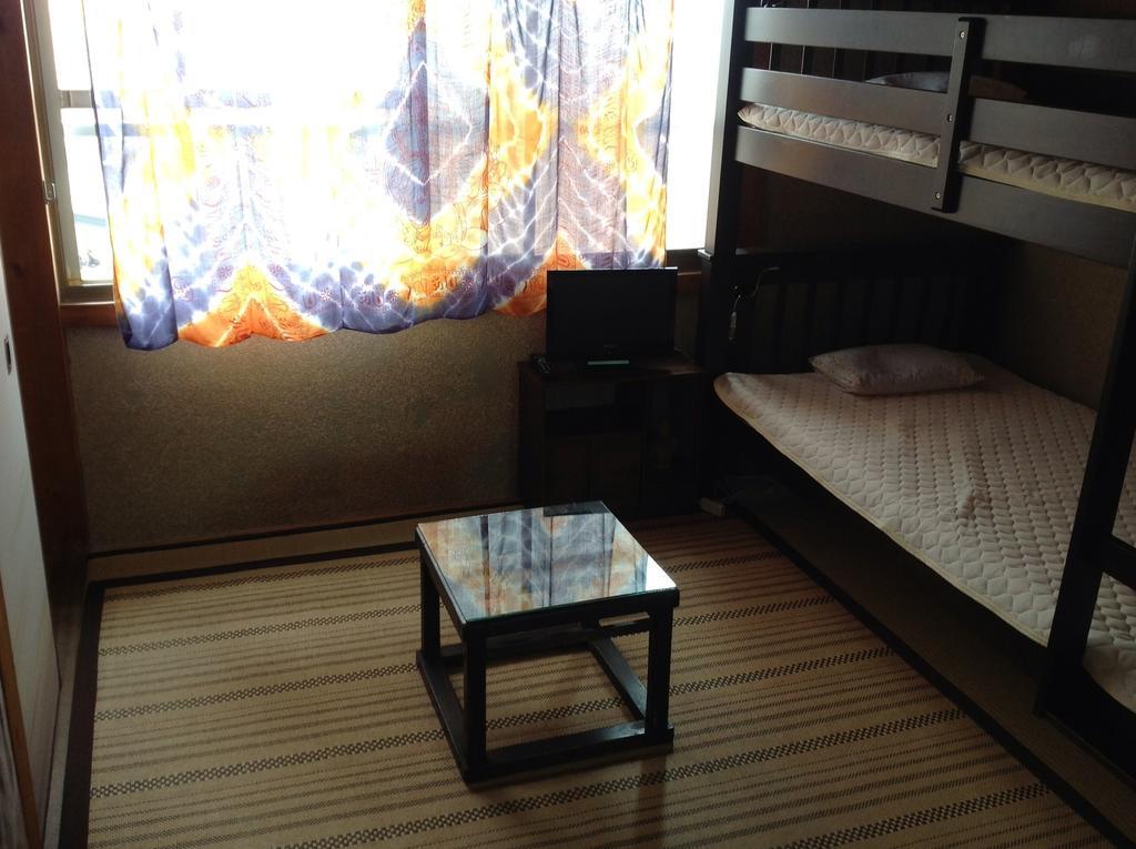Buddha Guest House Shirahama Onsen Zimmer foto